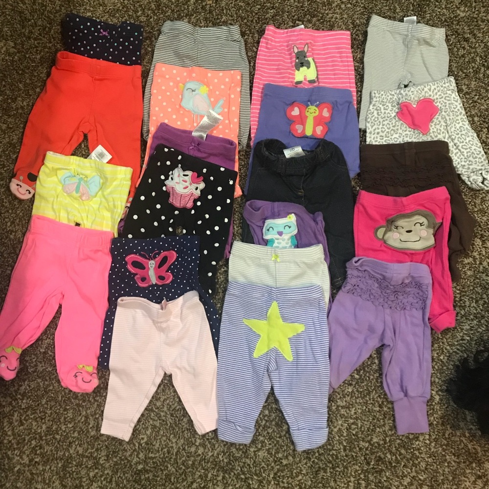 21 pairs of size NEWBORN girls pants